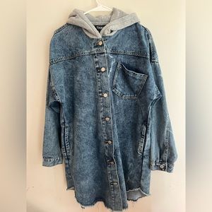 A Jean jacket with a hoodie from Thrill.
